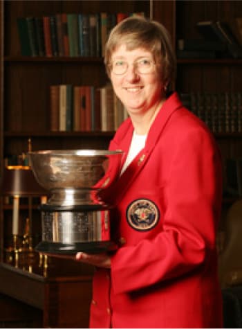 Martha Kirouac with the U.S. Curtis Cup.