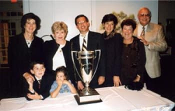 Johnny Skeadas’s family presents a trophy to the GSGA.