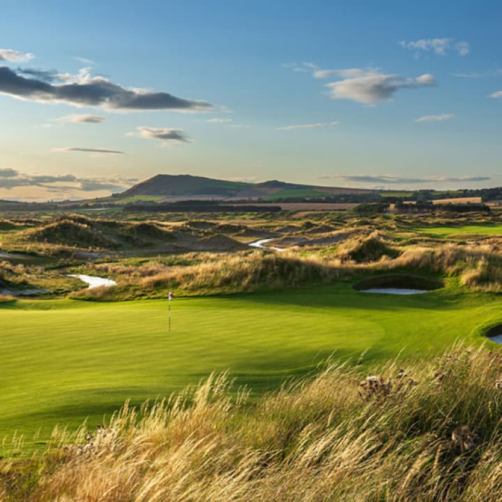 Dumbarnie Links golf course at sunset.