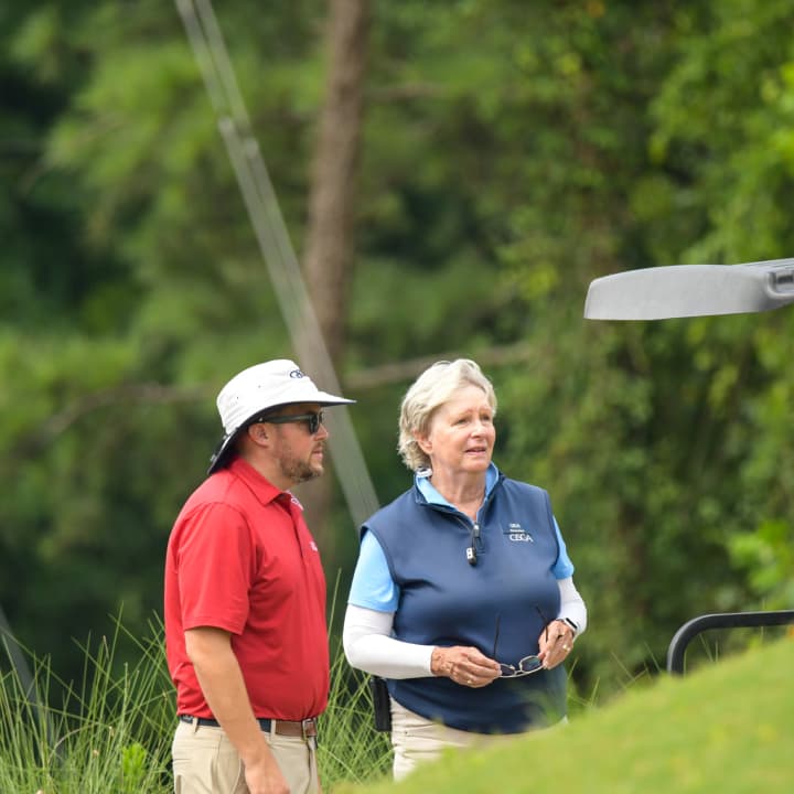 two golfers on a course